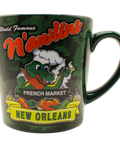 Mug with New Orleans-themed design featuring a cartoon alligator and text on a white background